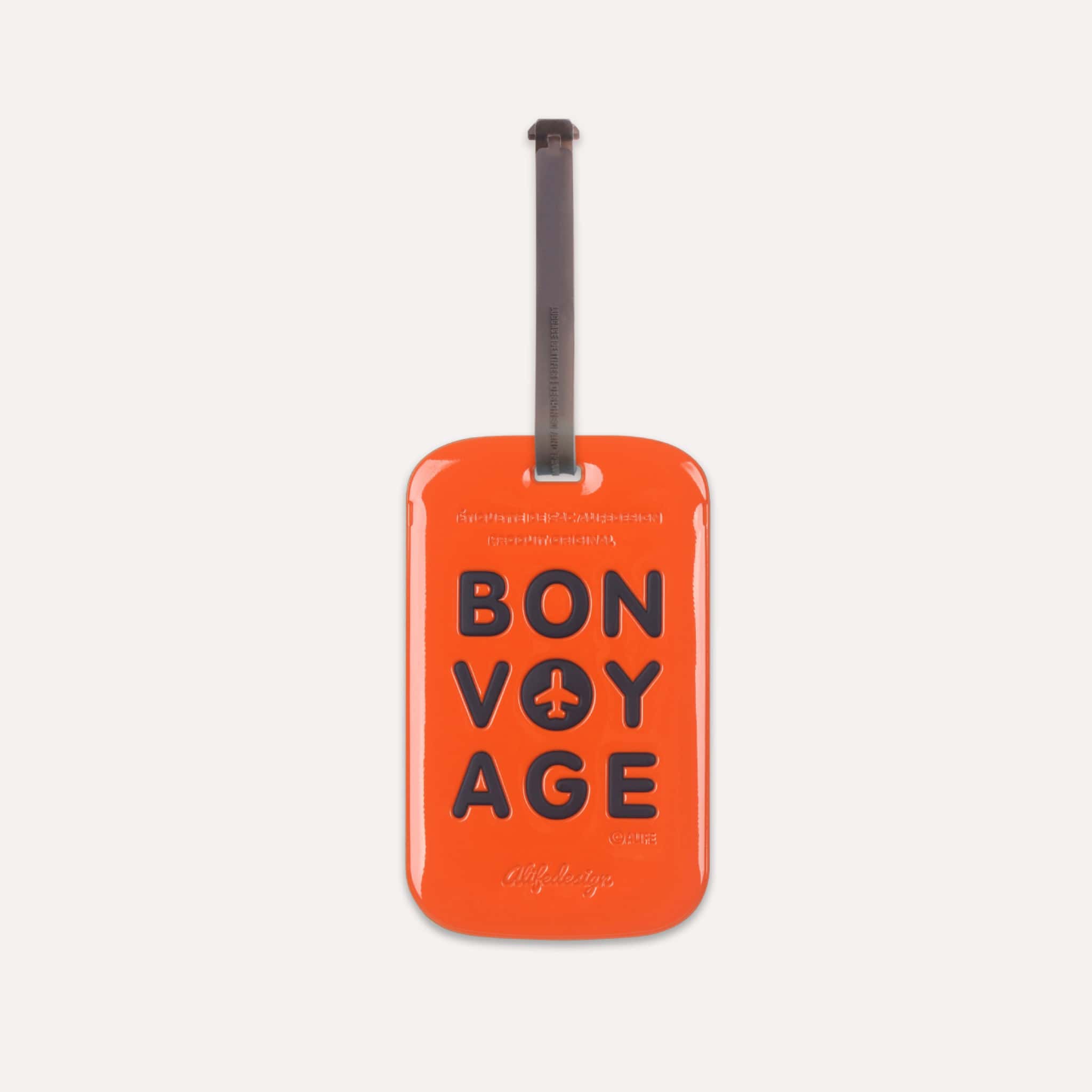 Étiquette bagage Bon Voyage Tag Orange de ALIFE DESIGN. Un accessoire de voyage moderne, pratique et coloré. Reconnaissez votre valise en un clin d'oeil.
