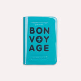 Charger l&#39;image dans la galerie, Bon Voyage Passport Cover Bleu est un porte-passeport coloré et super original de ALIFE DESIGN. Un accessoire de voyage indispensable et une belle idée cadeau pour les voyageurs.