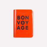 Charger l&#39;image dans la galerie, Bon Voyage Passport Cover Orange est un porte-passeport coloré et super original de ALIFE DESIGN. Un accessoire de voyage indispensable et une belle idée cadeau pour les voyageurs.