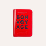 Charger l&#39;image dans la galerie, Bon Voyage Passport Cover Rouge est un porte-passeport coloré et super original de ALIFE DESIGN. Un accessoire de voyage indispensable et une belle idée cadeau pour les voyageurs.